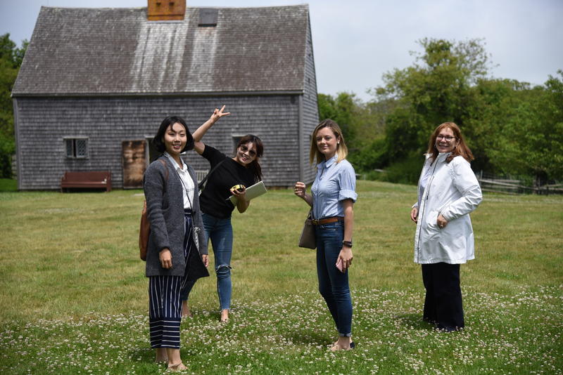 Arrival at Oldest House led by Dean Ellen Fisher (far right), students from left to right: Seryung Hong, Juhee Son, Audrey Keller. Courtesy Patricia Kennedy
