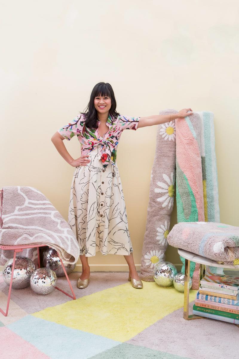 Joy Cho with her Lorena Canals rug collection; courtesy of Lily Glass