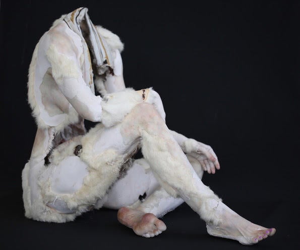 Monica Cook, Snowsuit, 2015. Aqua resin, wax, pigment, fur coats, fiberglass.