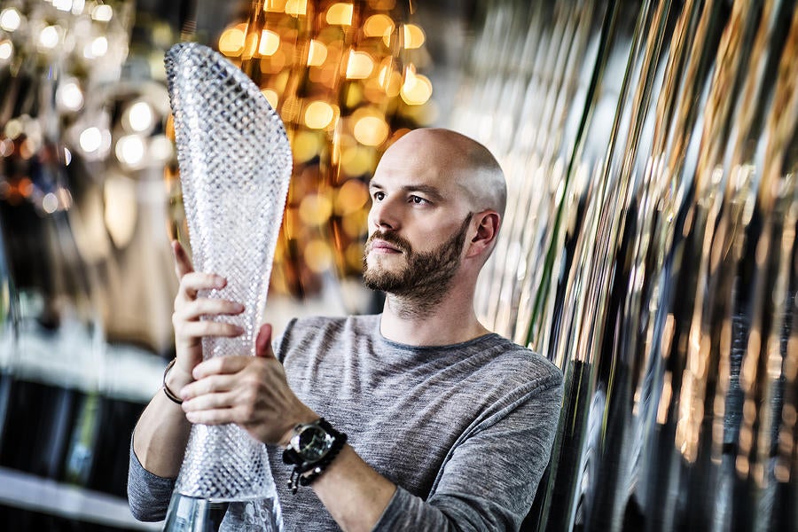 Lasvit’s Peter Olah holding the trophy