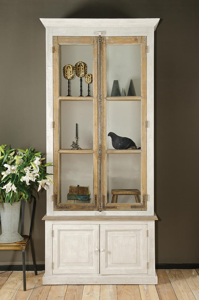 A cabinet from BoBo Intriguing Objects made with reclaimed windows from French chateaus