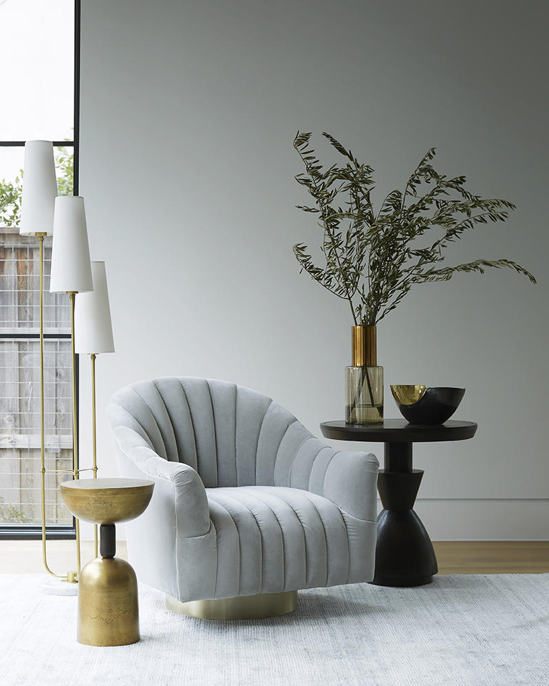 The Elizabeth torchiere, Dax accent table and Springsteen chair from Arteriors