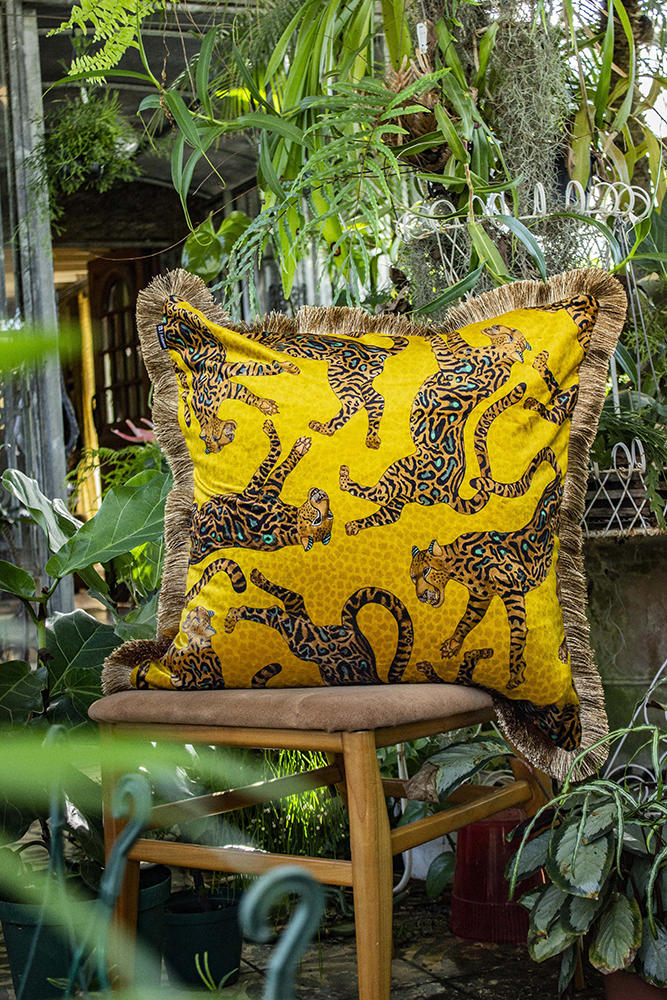 A pillow done in the Cheetah Kings fabric from Ngala Trading Co.