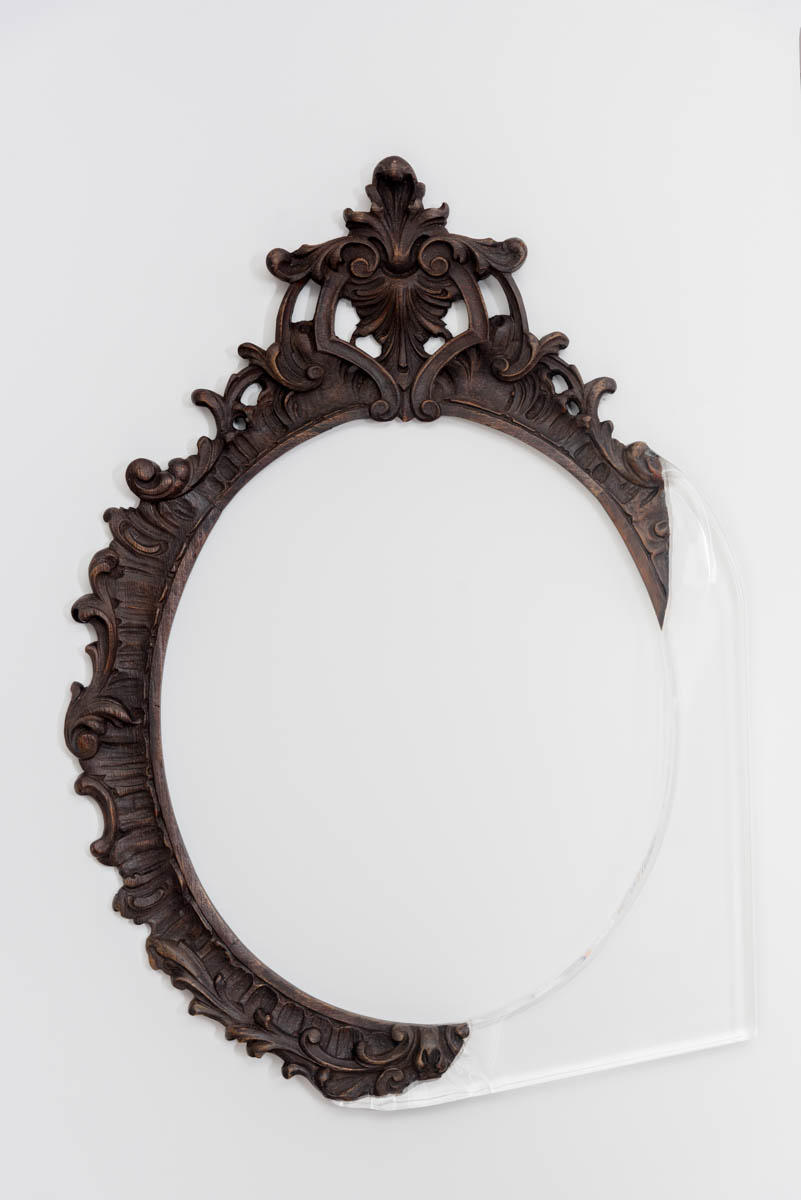 A hand-carved mirror gets a second chance with an injection of modern materials.