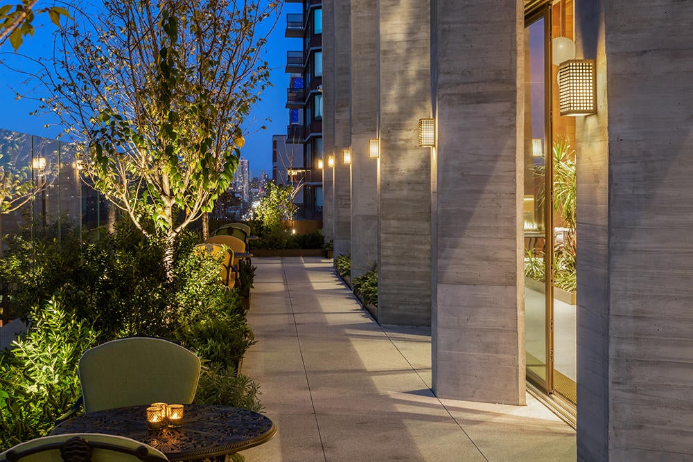 An outdoor terrace that lets residents connect to the outdoors without leaving the building.