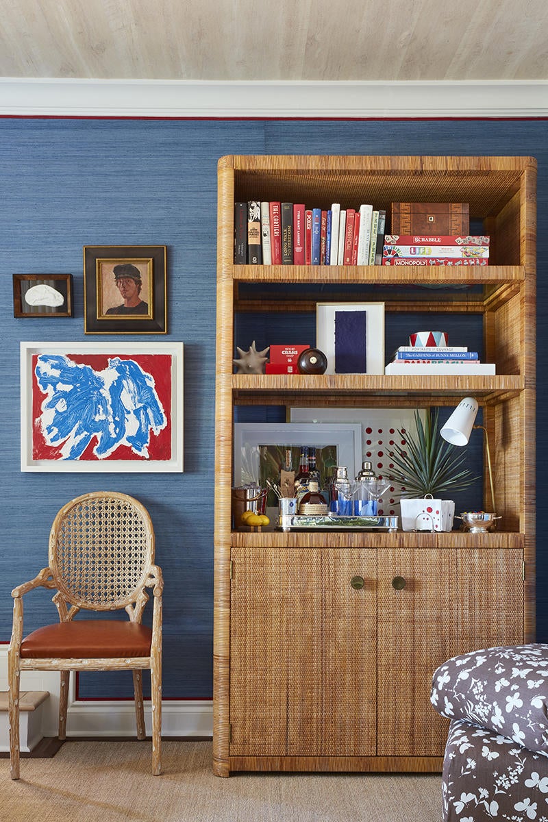 A bookcase-turned-bar in the Kips Bay room nods to Billy Baldwin.