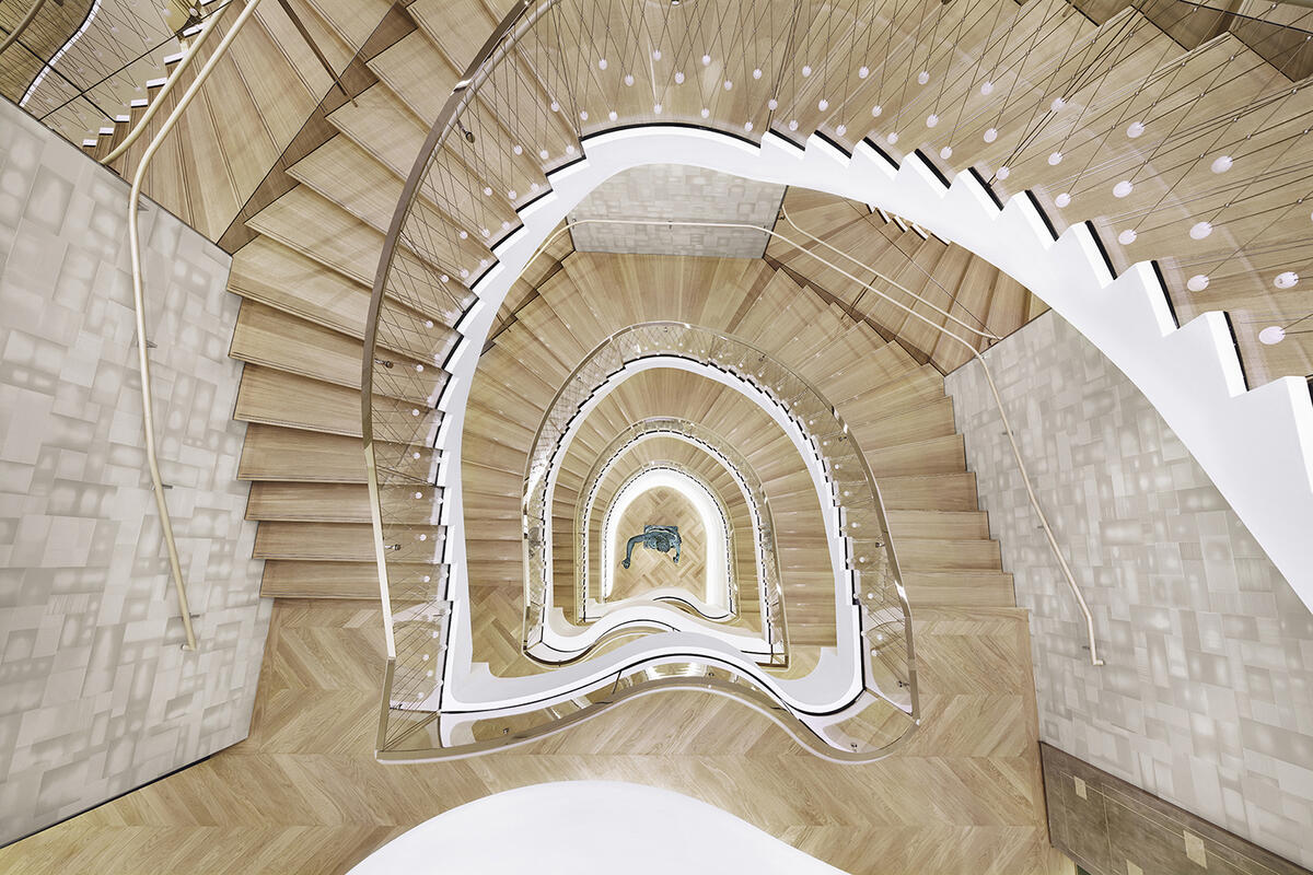 A grand staircase in the renovated Tiffany & Co. was inspired by the late jewelry designer Elsa Peretti.