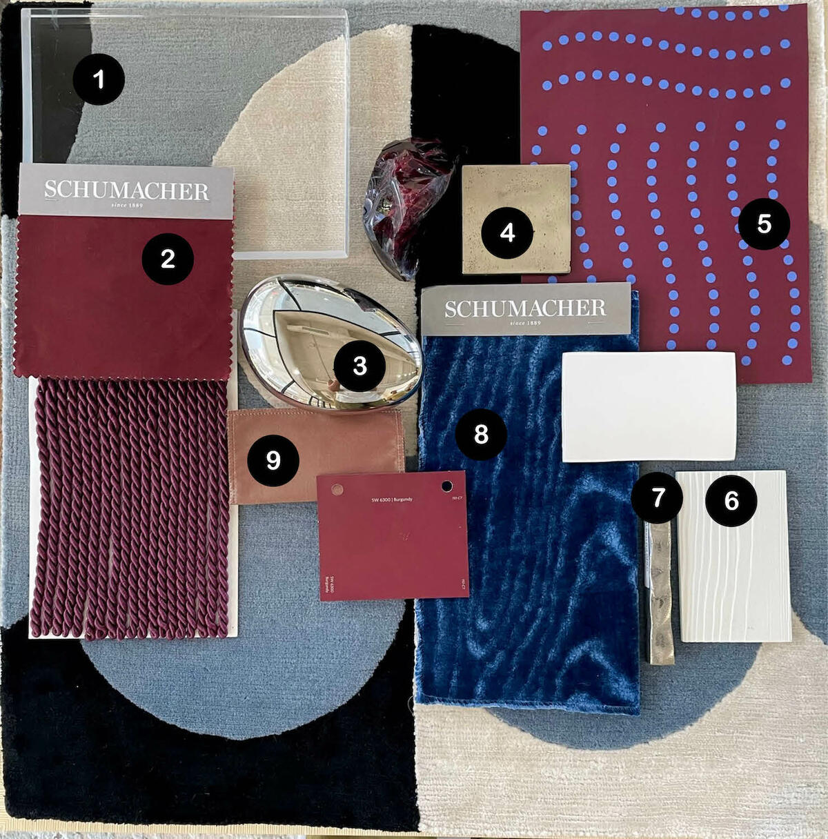 Forbes Masters’s futuristic mix of smooth metallic silvers, electric blue velvets and rich maroon taffetas
