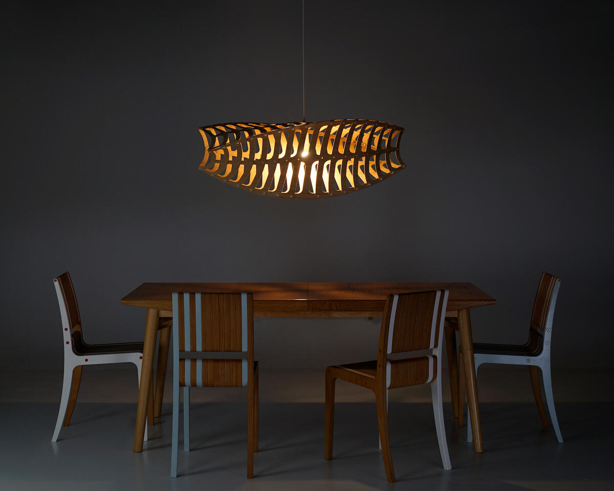 This self-taught woodworker went from ocean nomad to lighting design