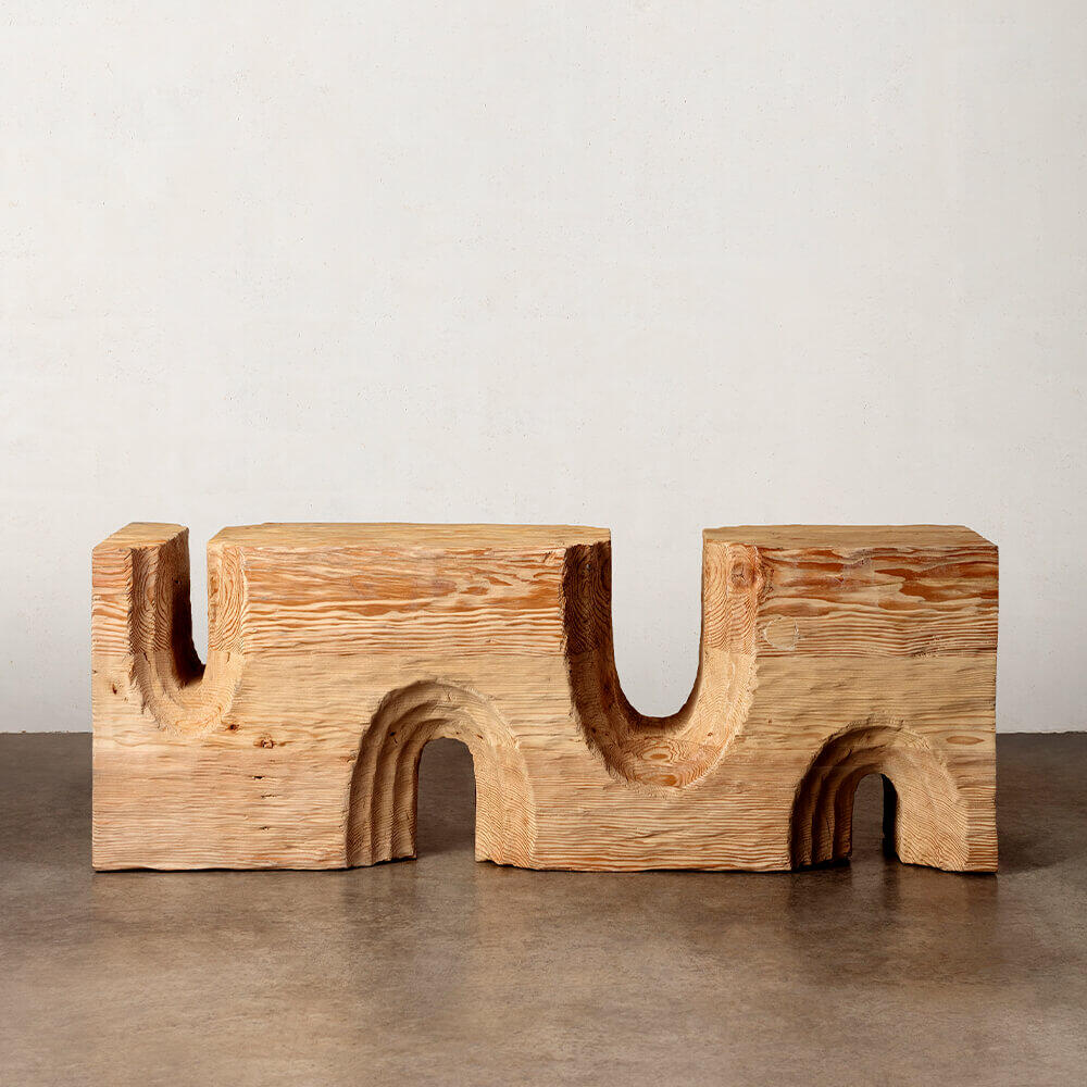 The Echo bench in Natural by Kelly Wearstler