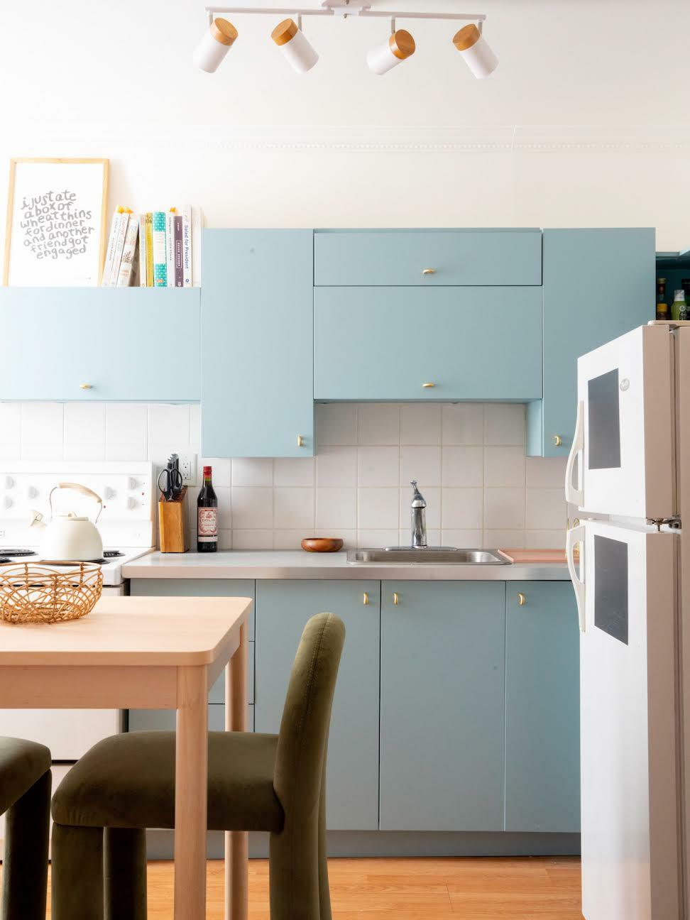 A serene kitchen with ice blue cabinetry