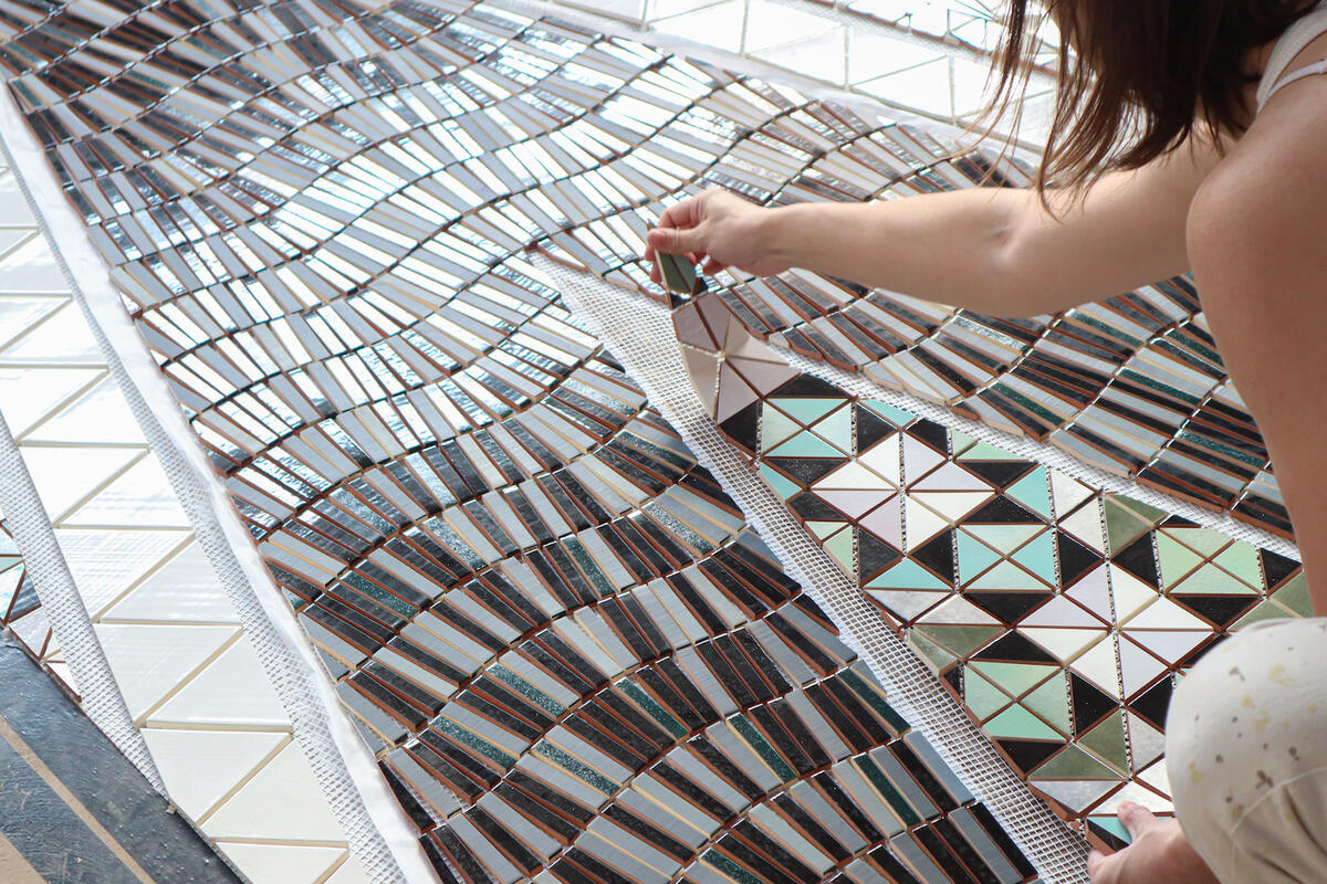 Morrison at work on Dyani White Hawk’s “Nourish” mosaic installation for the Whitney Museum of American Art