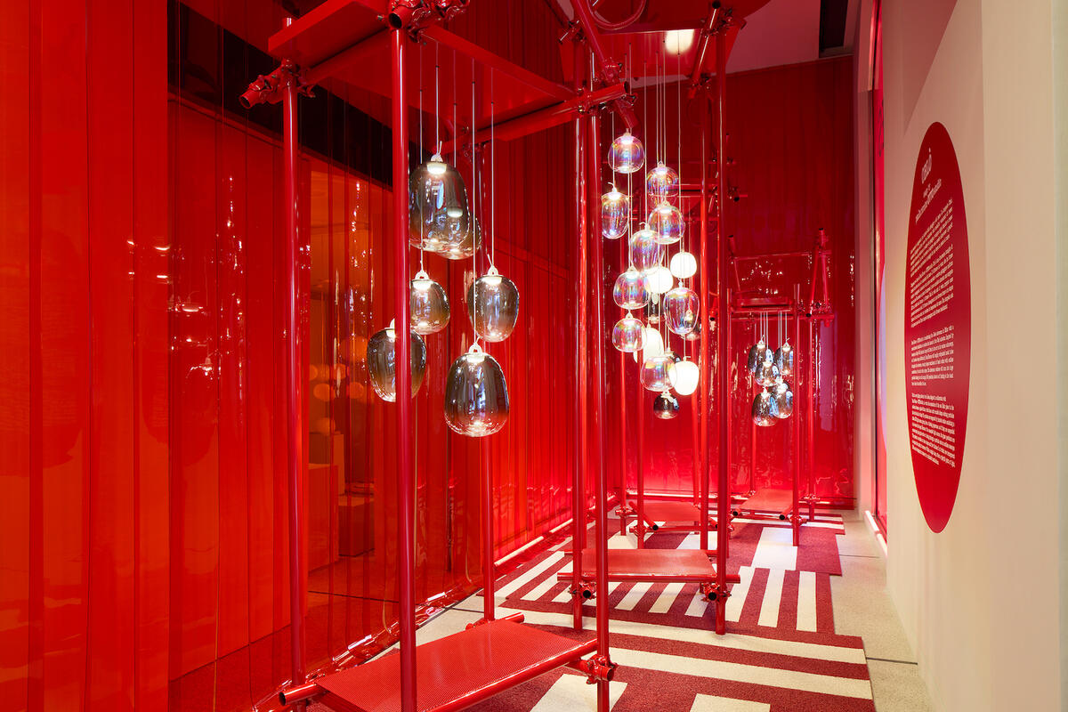 A scene from the Lodes showroom featuring Paola Navone’s Oblò pendants