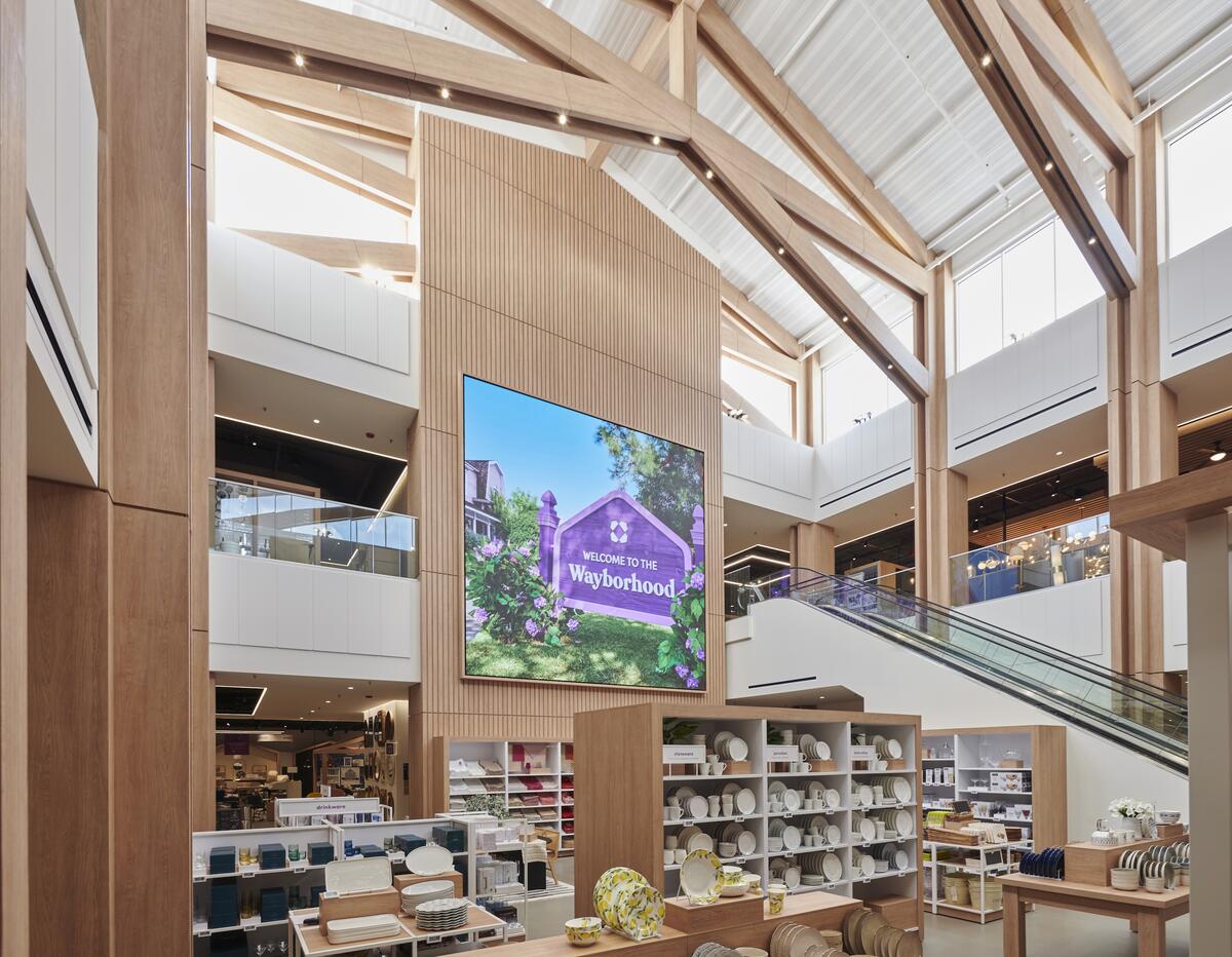 A two story atrium welcomes customers in the new Wayfair store in Wilmette, Illinois.