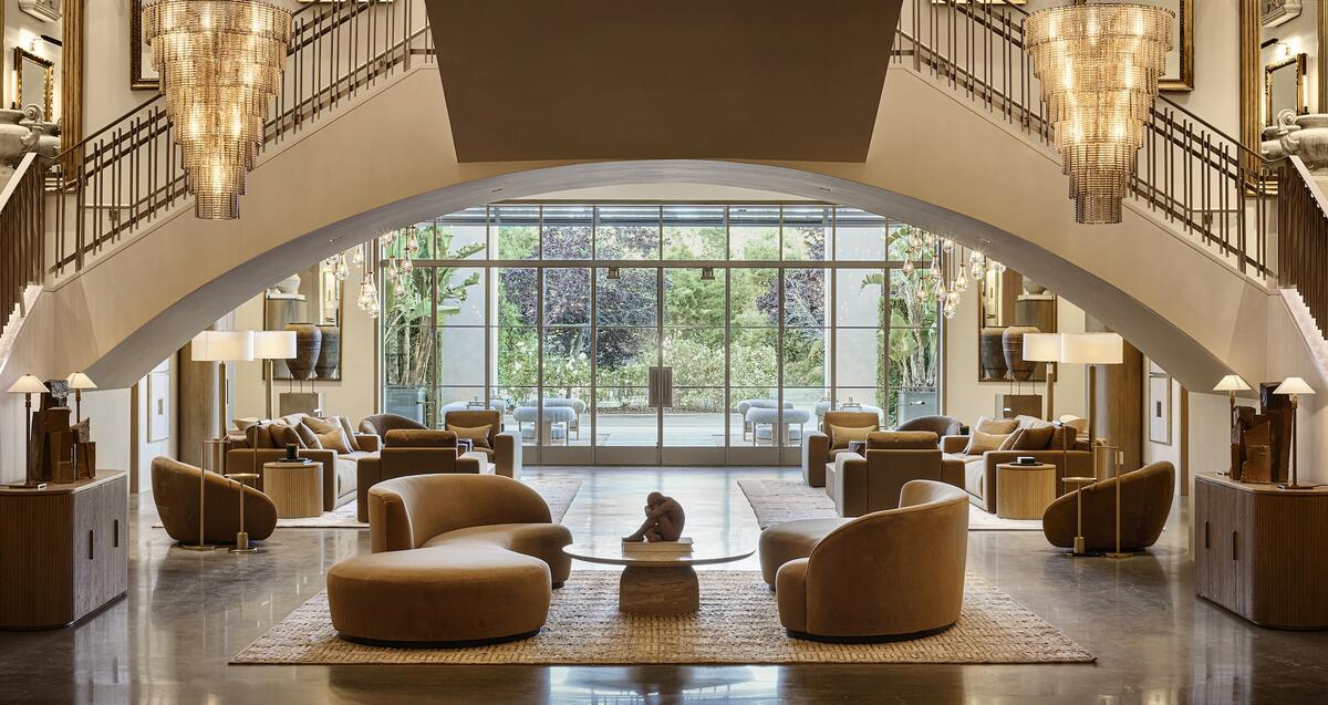 The grand entrance and floating staircase at RH Palo Alto