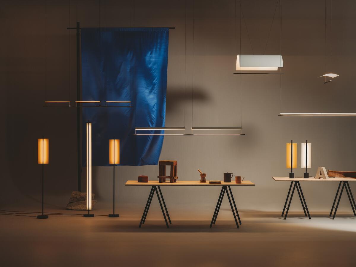 Selections from Santa & Cole’s Lámina series, including the Lámina Dorada 45 floor lamp, pendant lamp and table lamp 