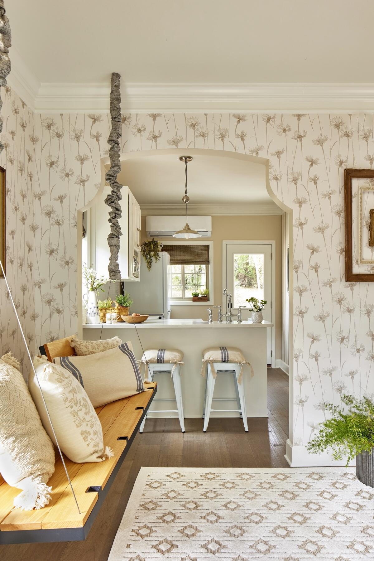 A suspended bench makes a statement in this sitting room 