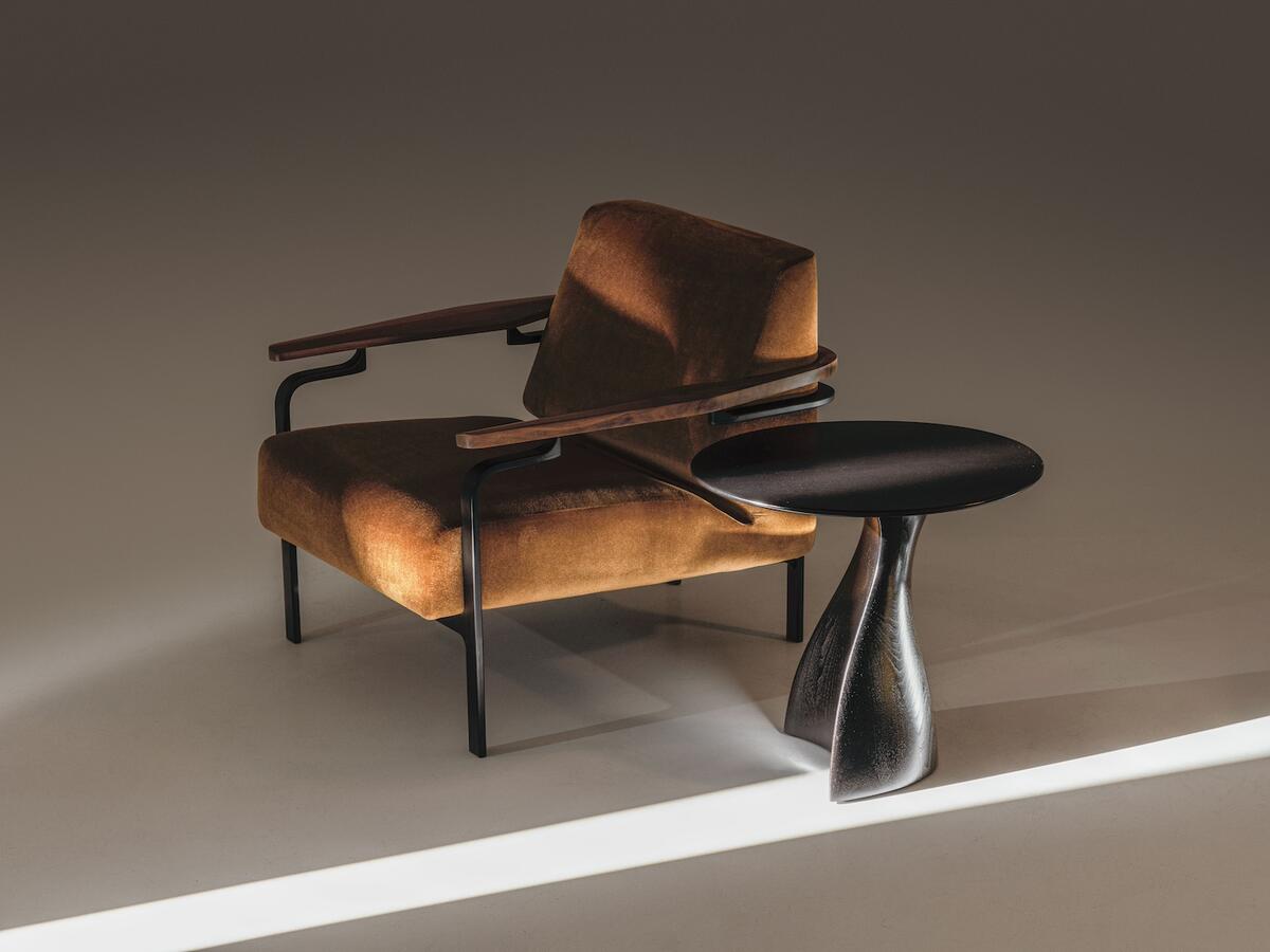 The Ursa lounge chair and the Ban and Yan side table by Holly Hunt