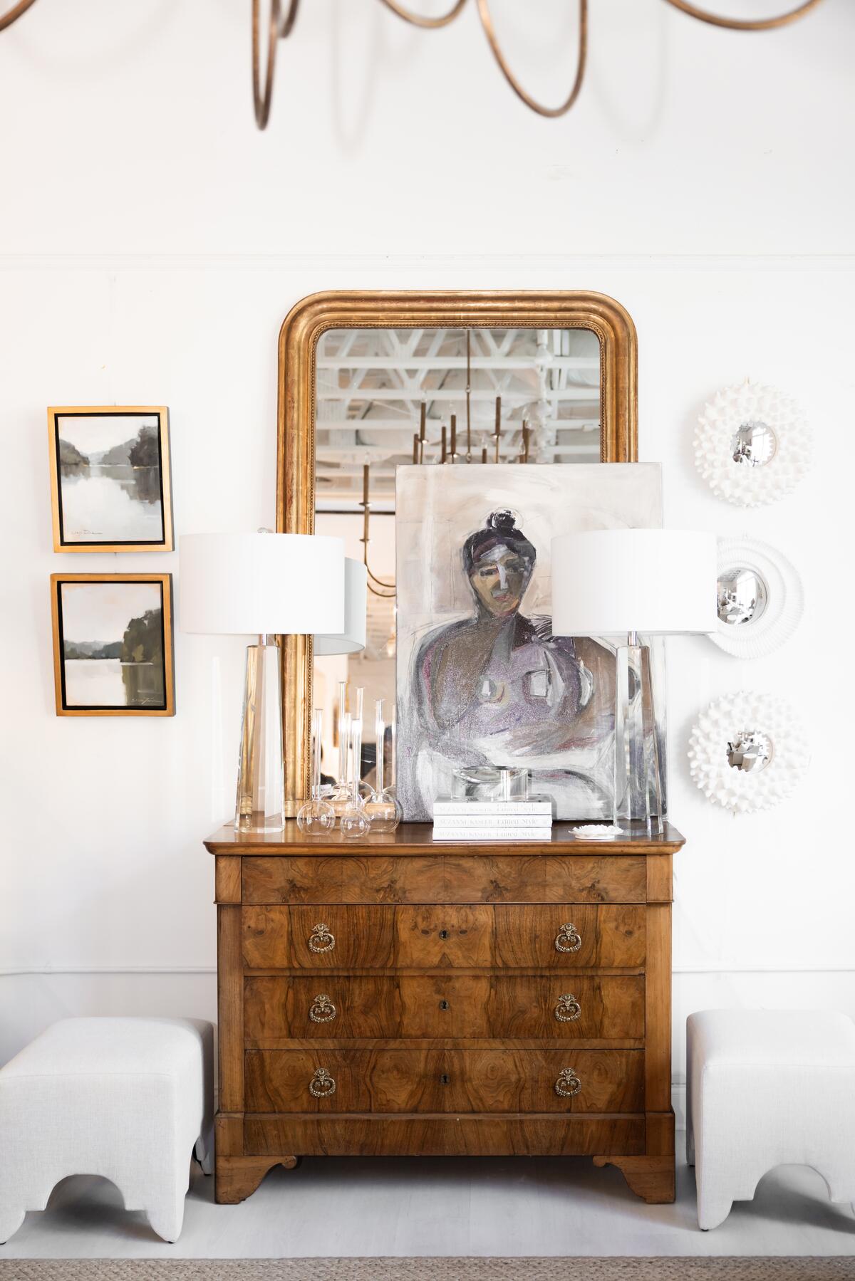 A wall vignette in the Atlanta store that features both vintage and modern elements