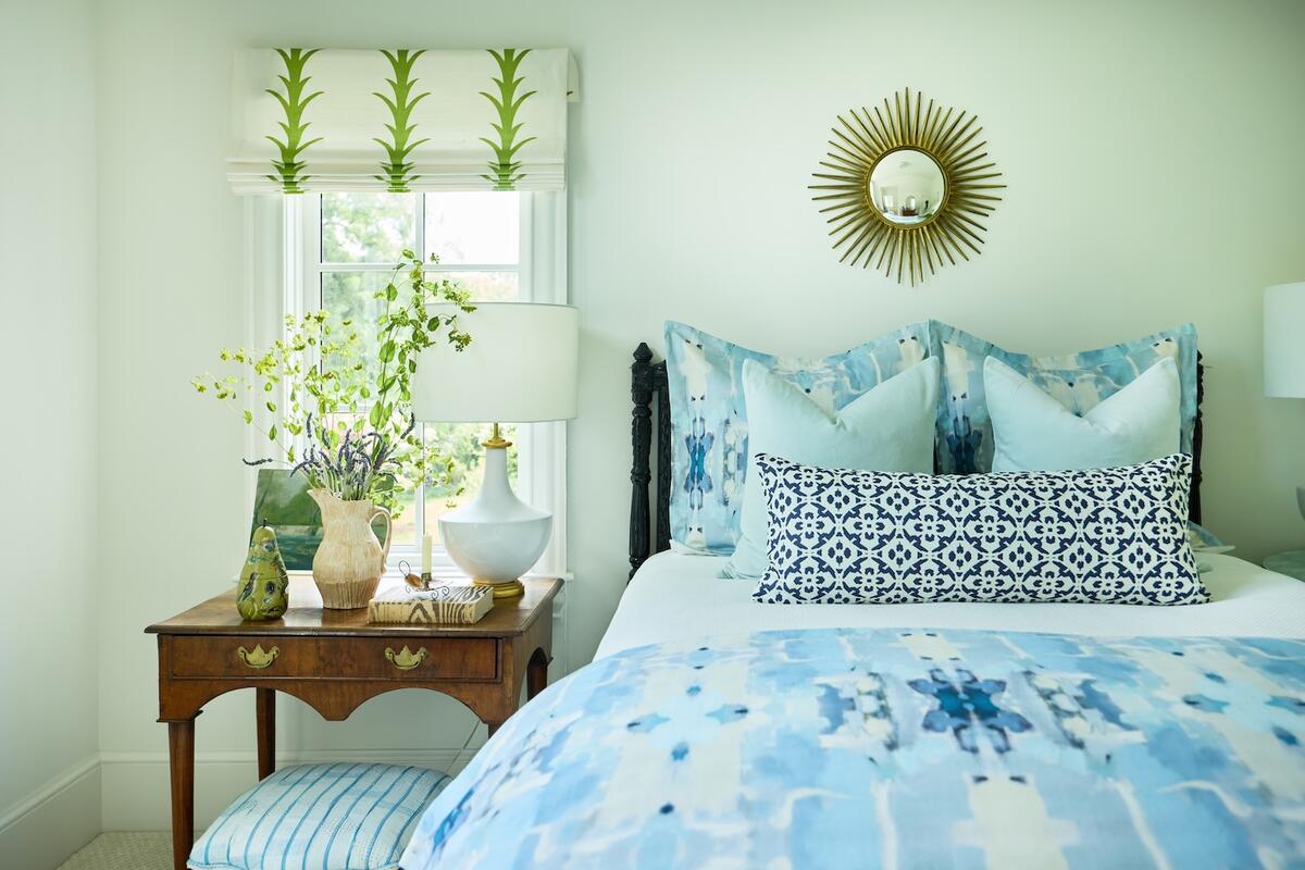 Laura Park’s Ocean Breeze (duvet cover and shams) and Porto Tiles (bolster pillow)