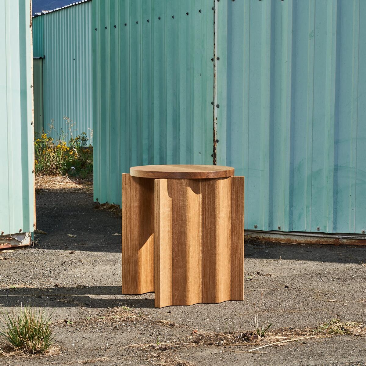 A piece from Lourens’ “Corrugated” collection, a side table that doubles as a stool