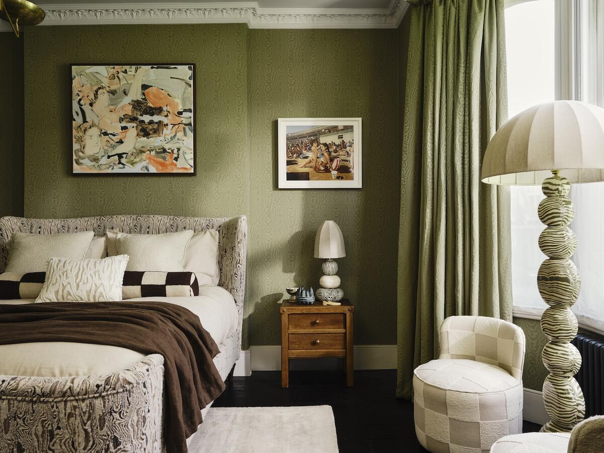 Selections from the Harlequin x Henry Holland collection, including the Elsworthy wallpaper in Neptune Green and Marble Tapestry fabric in Chocolate (bed frame)