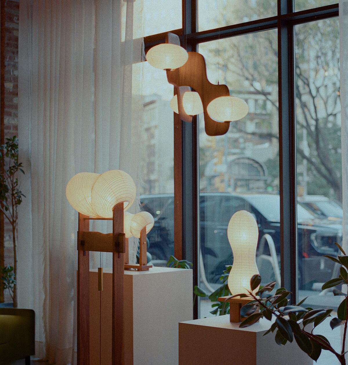 A selection of lights by Kawabi, including the Cascade pendant and Legume lamp, available through Colony 