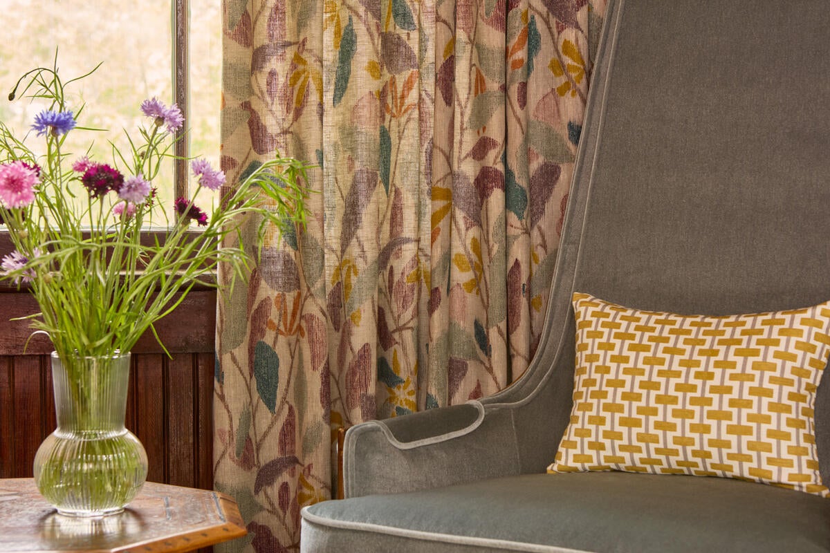 Drapes made from Pollack’s Lark in Huckleberry from its Spring Street line 