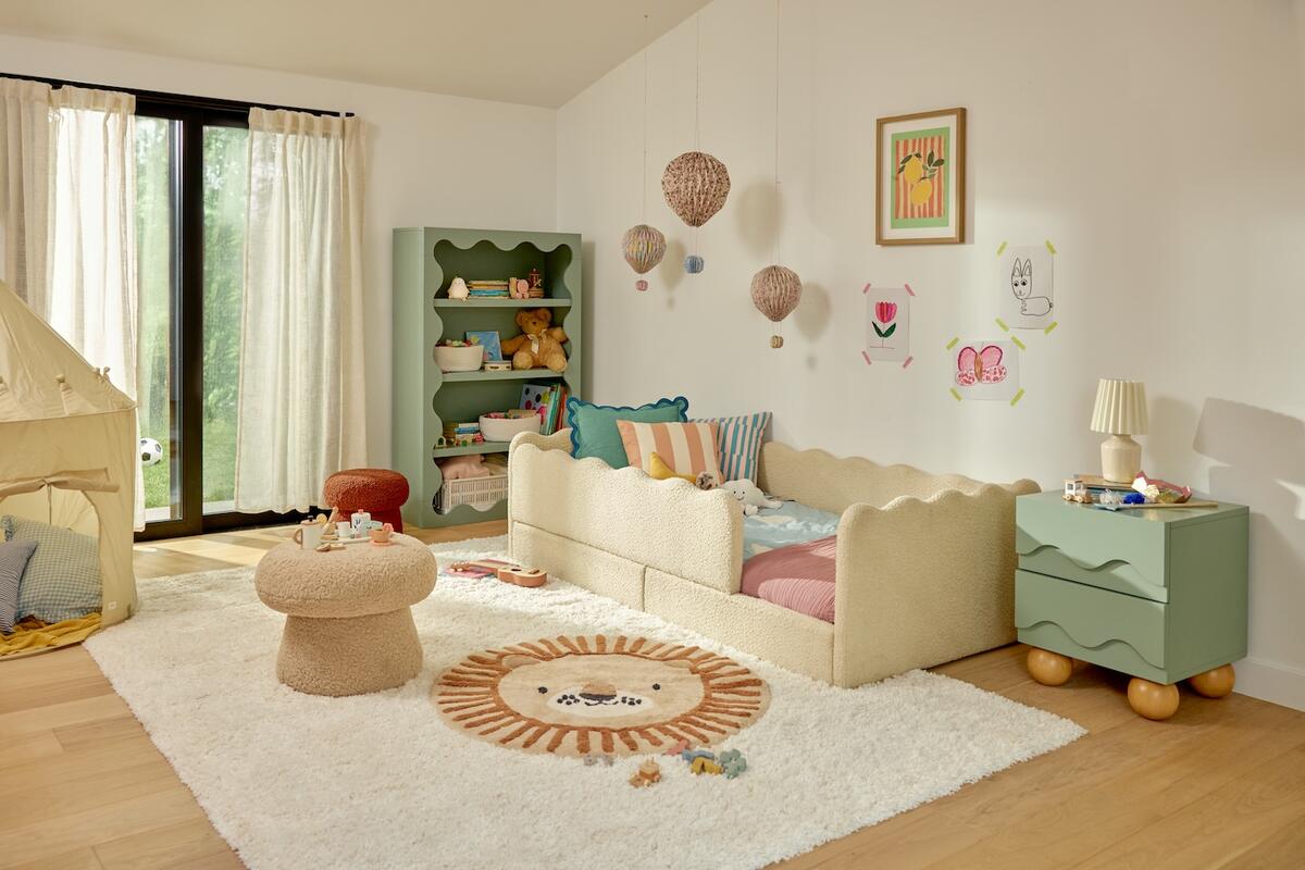 The Mushroom pouf in Chai Shearling and Montessori-inspired Rizo twin bed by Babyletto