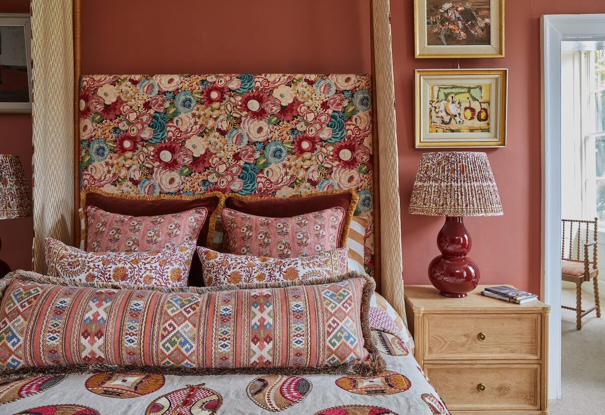 Selections from Ian Sanderson’s Friday Club collection at John Rosselli & Associates, including a headboard upholstered in Florella Linen in Garden Party 