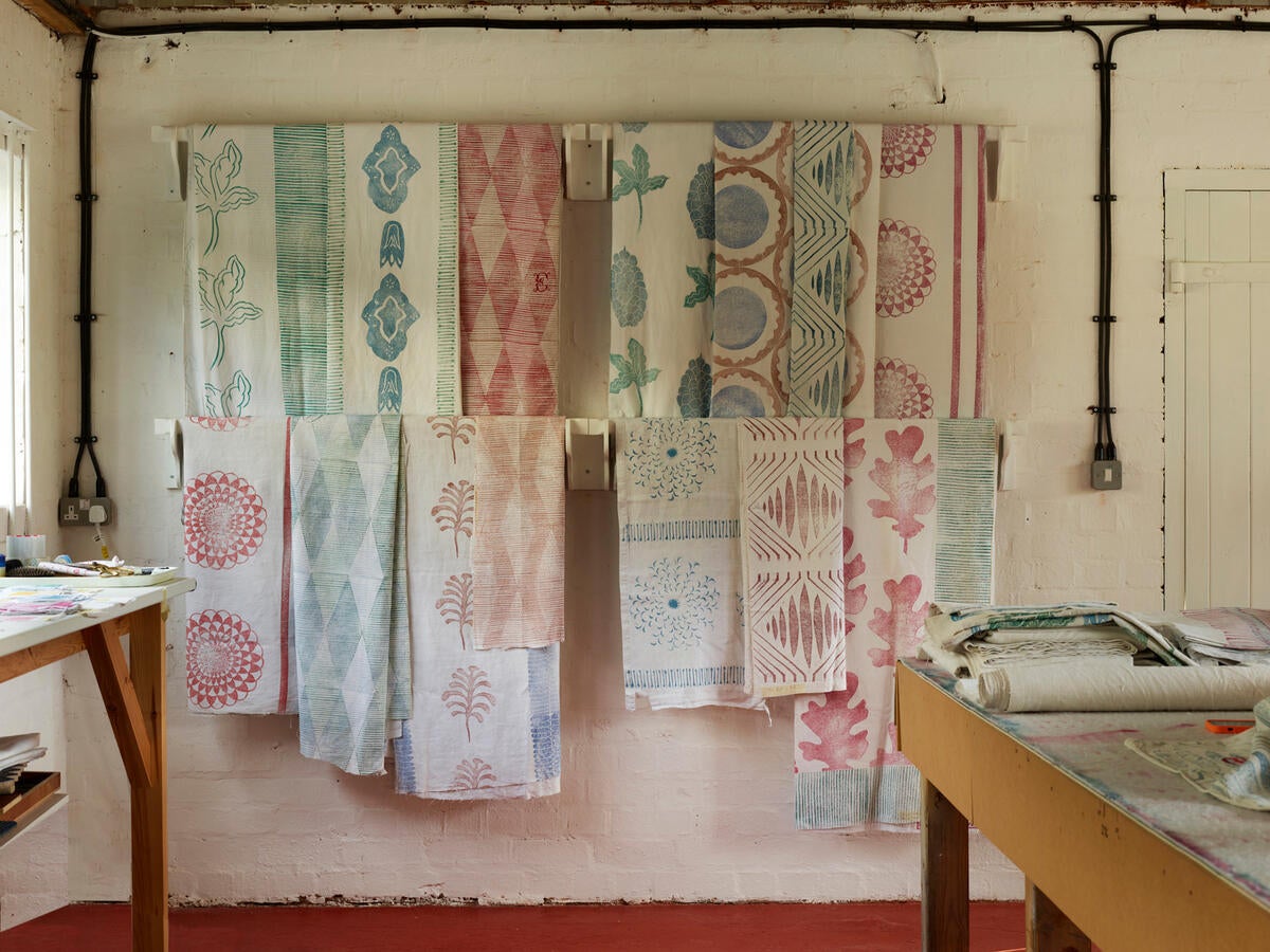 This English textile designer block-prints her designs by hand onto antique linens