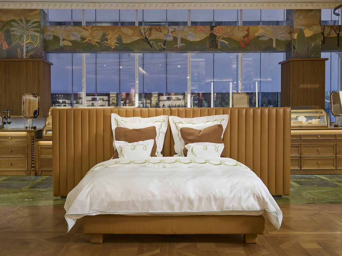 This expert seamstress crafts couture-quality upholstered bed frames