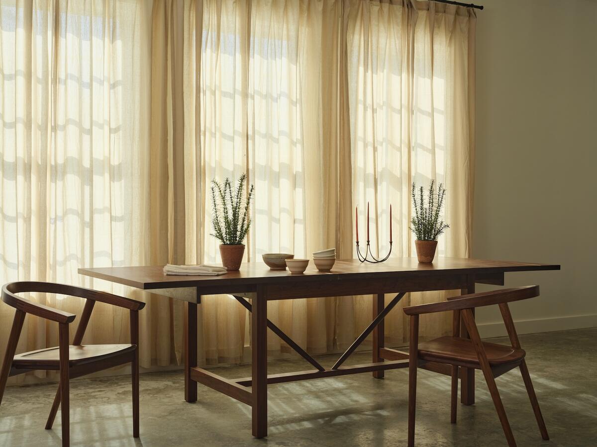 The Intervale extension table in walnut by Thos. Moser x Adam Rogers Studio