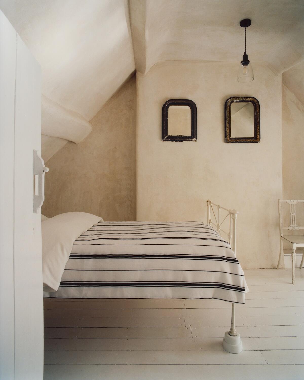 The Triple Stripe bedspread in Dusty White/Black by Nordic Knots