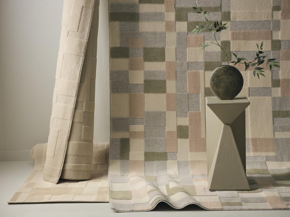 Clockwise from right: The Mixtura rug in Calacatta, Travertine and Botticino by Anderson Tuftex