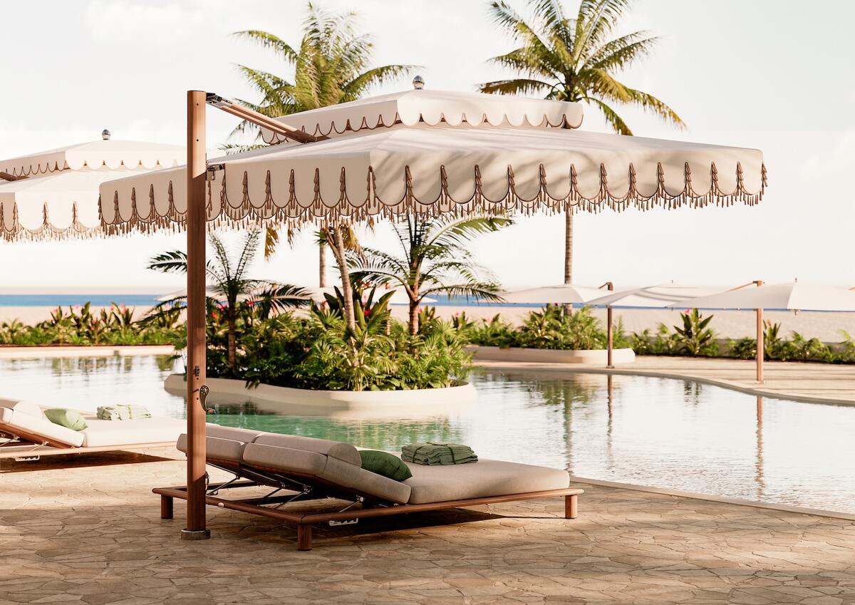 Tuuci’s Ocean Master Max Cupola Cantilever in Natural Aluma-Teak finish and custom tasseled shade