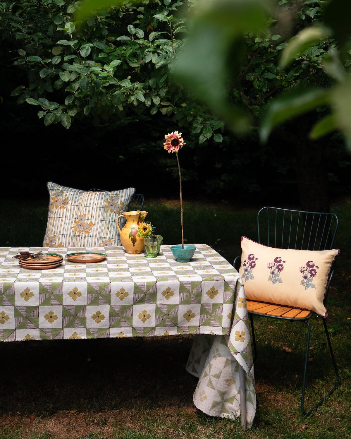 The Rama outdoor pillow in Pistachio and the Meera outdoor pillow by Soil to Studio x Cloth & Company