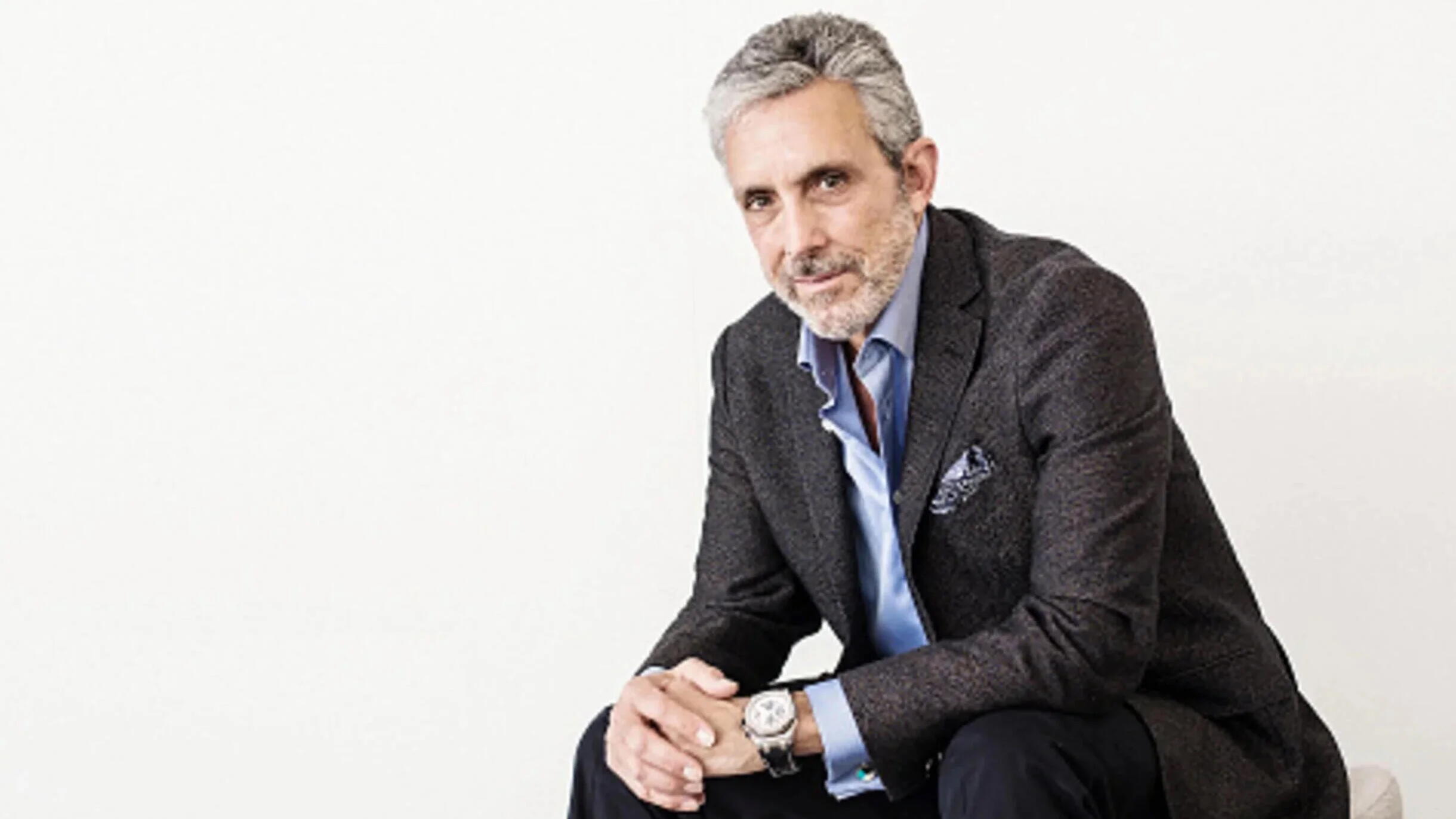 Charles Cohen settles $187 million debt