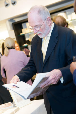 Christopher Jones looking at his copy of ‘The Perfect Bath’ 