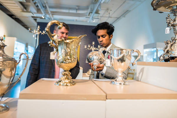 John Ward, head of department, silver & vertu and Specialist at Sotheby's, and Rajiv Surendra perusing Silver
