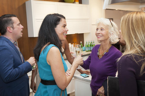 Artist Maureen Chatfield, talking with other guests