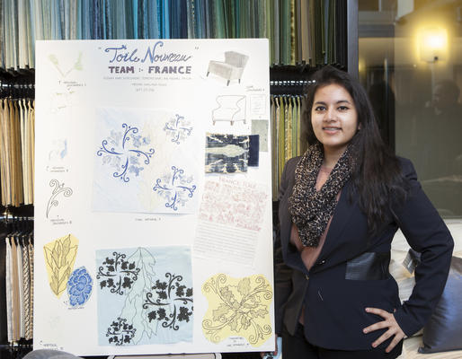 NYIT student Alishah Khan with the Team France design board