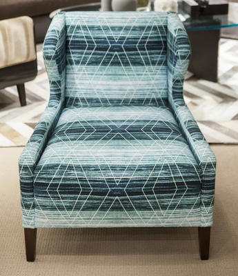 The winning team's fabric upholstered on the Kravet Williams Chair