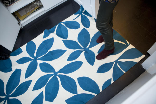 A hand-knotted rug in a vibrant and bold print