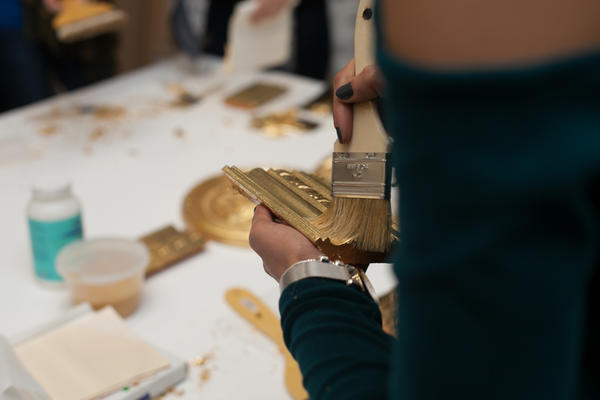 A detail of the gilding process
