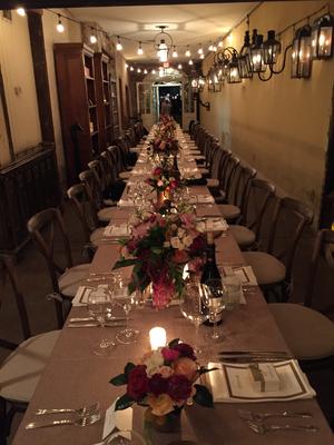 The table is set for dinner at Bevolo Gas & Electric Lights. 
