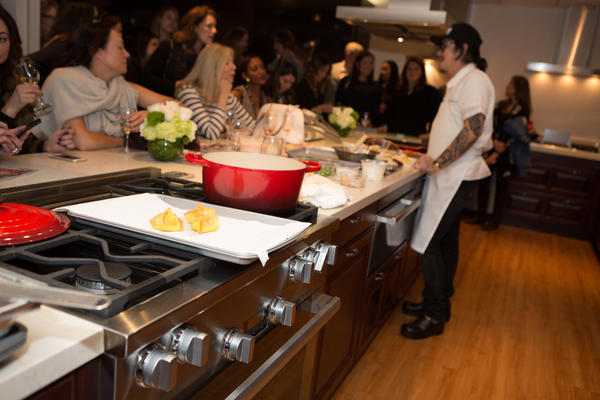Chef Kris Yenbamroong demonstrating for guests