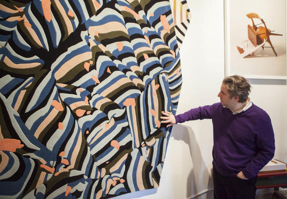 NYSID ASID student Tom Sembros getting a better feel for the 100% New Zealand wool Banner rug