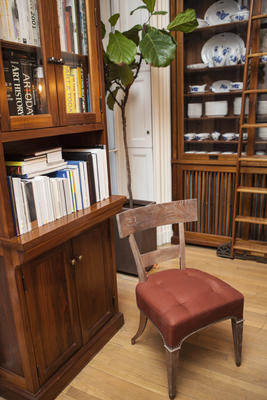 A klismos-inspired dining chair and custom cabinetry in the dining room