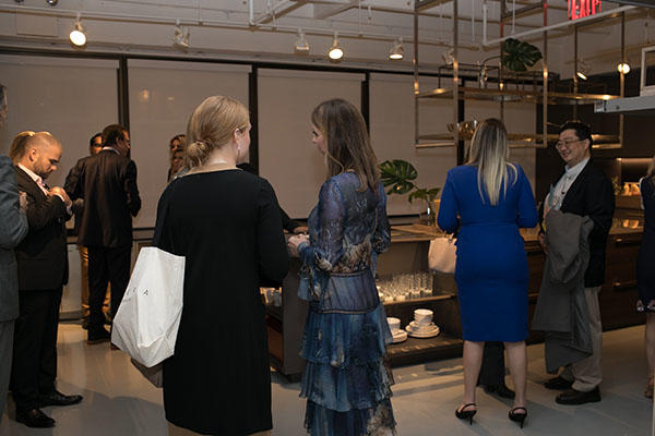 Guests mingling in the space 